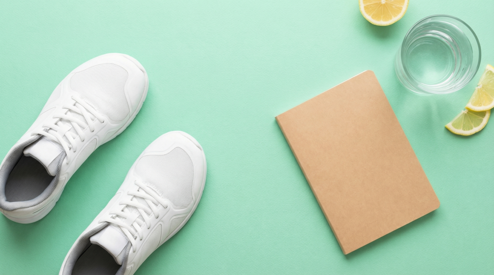 Prediabetes lifestyle tools — running shoes, sleep journal, and a glass of water on a mint green background