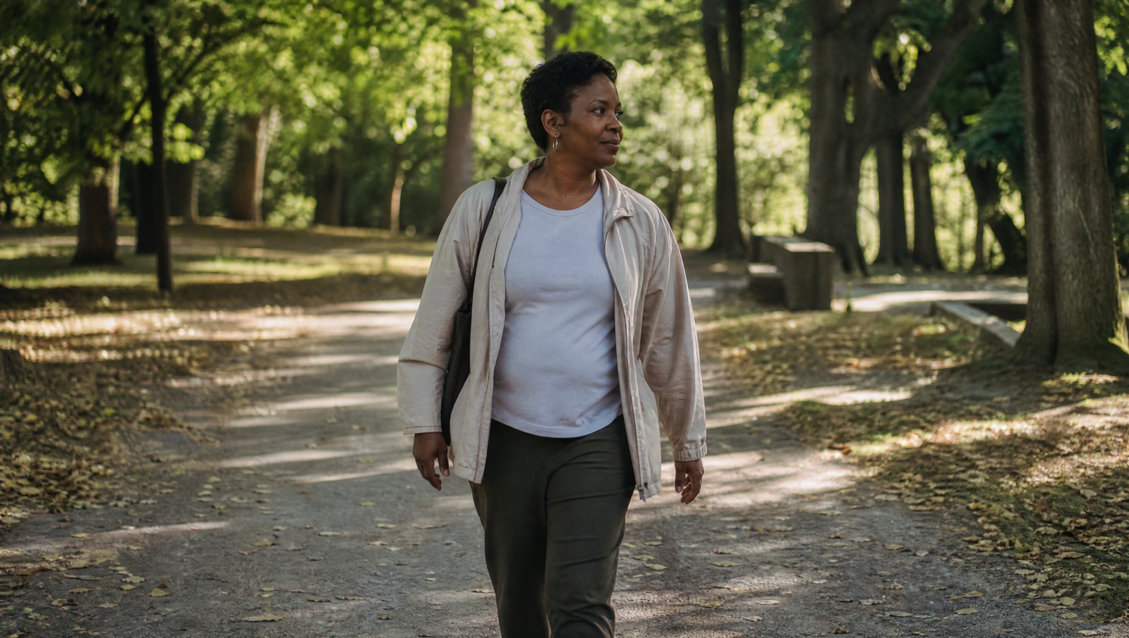 woman on an outdoor walk after eating to support prediabetes management naturally